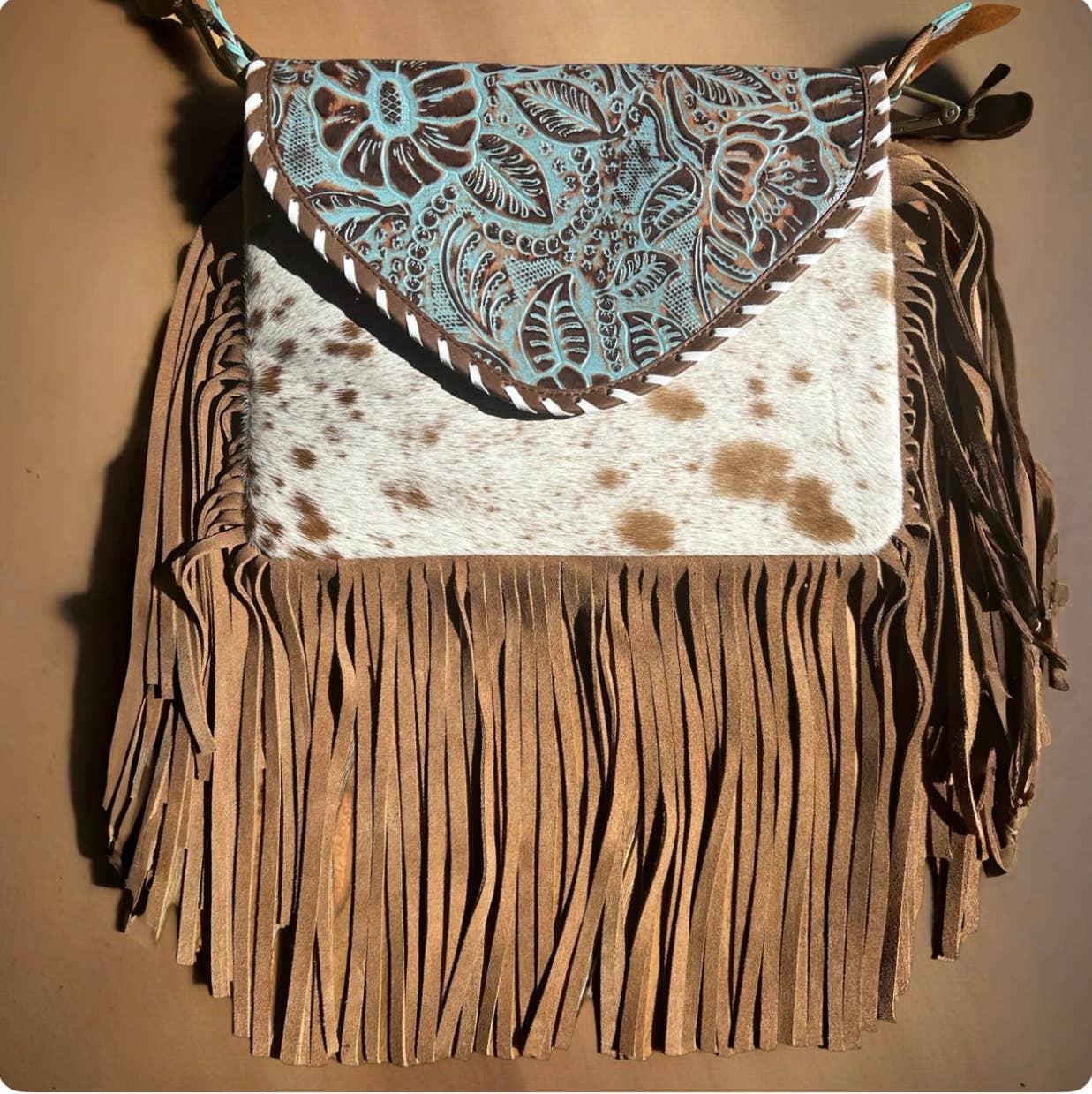 Cowhide Embossed Leather Fringe Handbag
