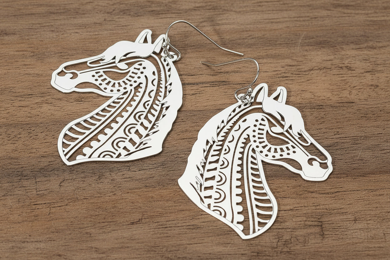 Gold horse head earrings