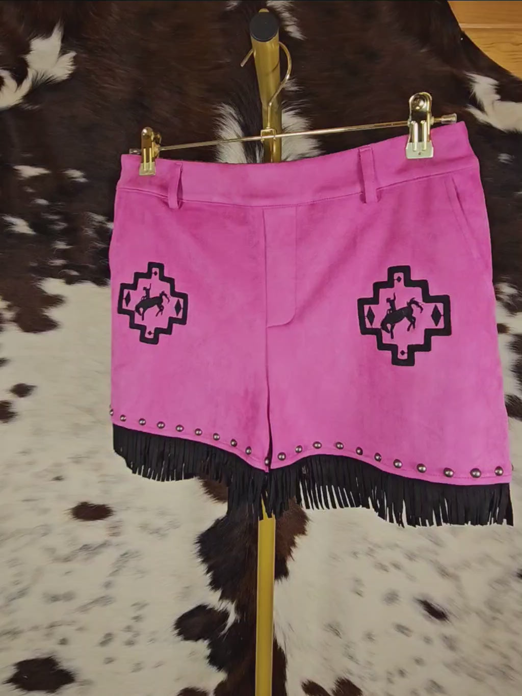 Pink shorts with black fringe
